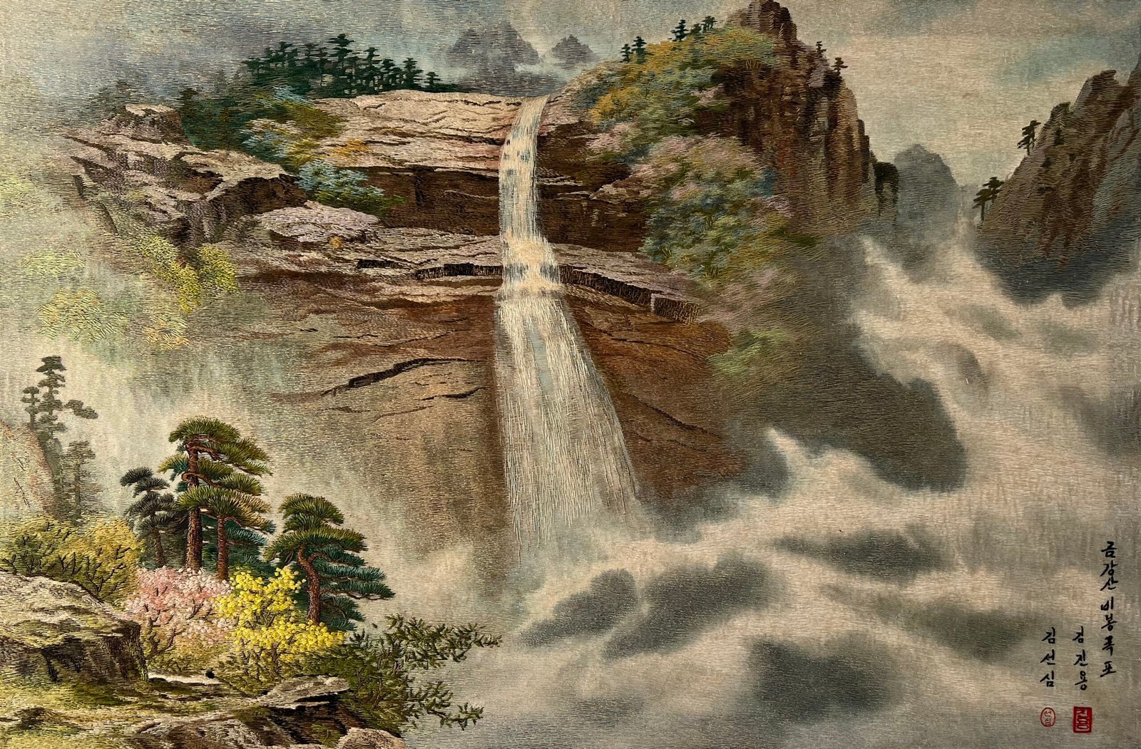 Pintura en pergamino con cascada